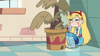 S2E36 Star Butterfly hiding behind potted plant