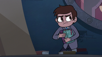 S3E24 Marco picking up Mina's books