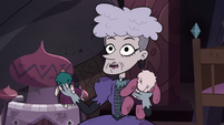 S3E24 Miss Heinous holding her old dolls