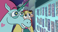 S2E33 Star, Marco, and Pony Head look at lounge photos