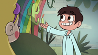 S1E14 Marco pointing at rainbows