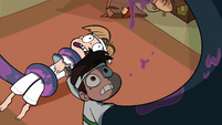 S1E5 Monster arm towers over Marco