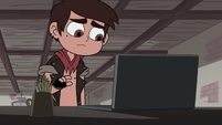 S2E31 Marco Diaz approaching his computer