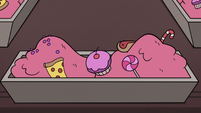 S3E21 Trough filled with junk food and pink slop