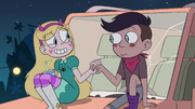 S2E41 Star Butterfly puts her palm on Oskar's hand