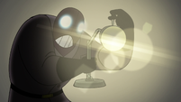 Masked Man turns lamp on