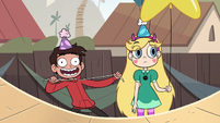 S2E29 Marco excitedly pulling his hood cords