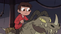 S3E22 Marco Diaz mounting his dragon-cycle