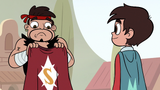 S3E13 Sensei holding a cape with an emblazoned 'S'