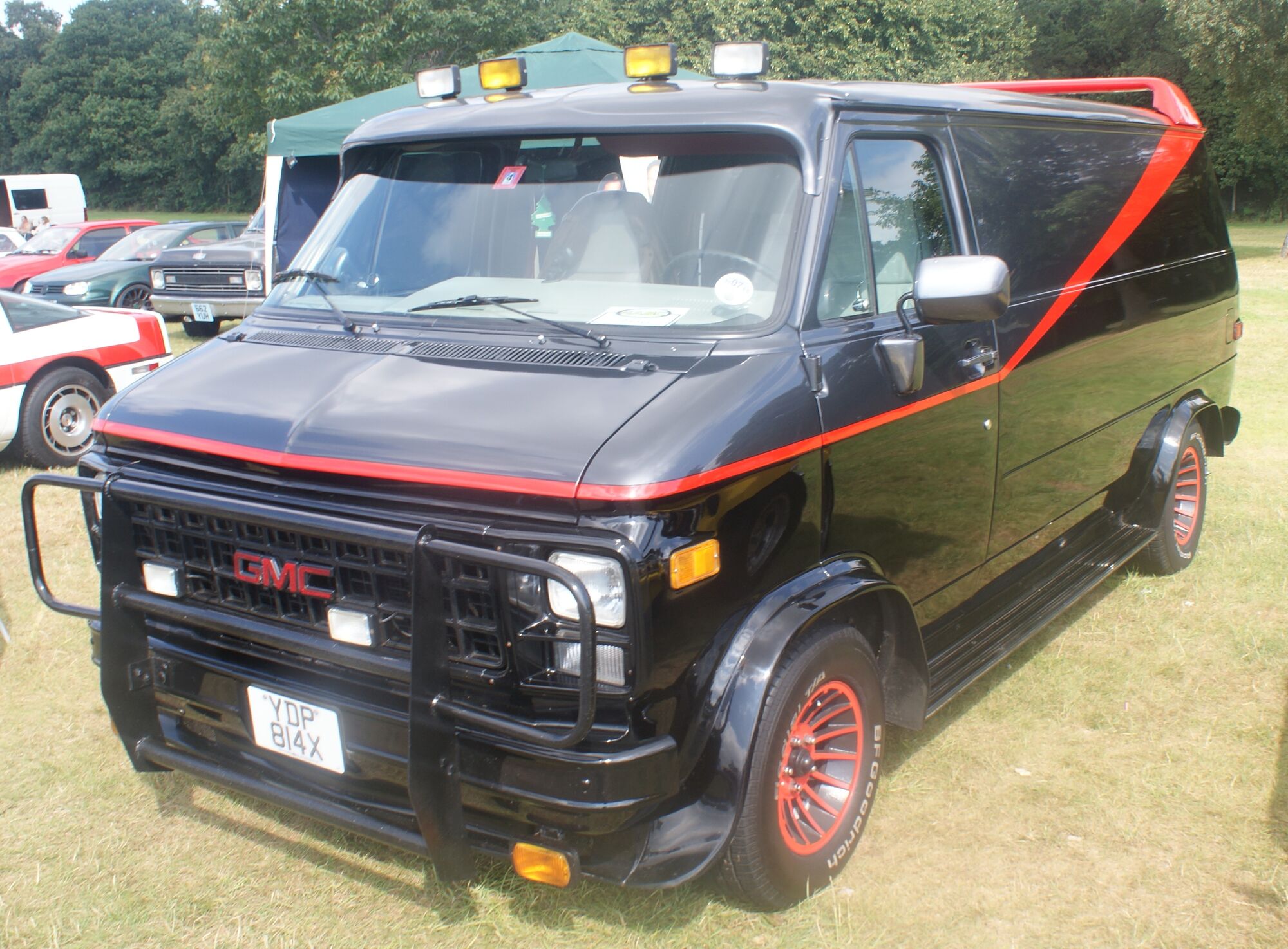 black van with red stripe