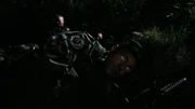 Major Gil Hawkins' eyes flash, revealing that he has been possessed by a Goa'uld.