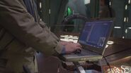 A laptop used by Rodney McKay, connected to an Ancient console, upon arriving at Atlantis.