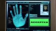 The palm scanner accepting Sam's handprint.