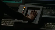 Carter using the palm scanner again in 2002 during the Season 6 episode, "Redemption Part 2".