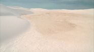 A dried-up lake bed on the planet.