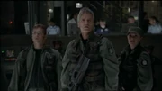 Daniel, Jack and Sam watching as the Stargate abruptly shuts down.
