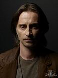 Nicholas Rush (Robert Carlyle)