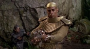 Apophis in gold armor.