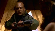 Battle of P8X-873 5.jpg (67 KB) Teal'c ready to fire his staff weapon.