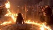 Vala, in Sallis' body, being burned to death.