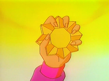 Princess Gwenevere holding high the Sun Stone in "Badlands"