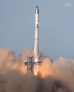 Starship 15/34 lifting off the pad.