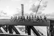 Workers on chopsticks, possibly around stacking of B12