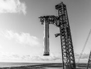 OLIT-1 chopsticks during stacking of B12. c SpaceX