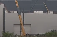 The first two vertical steel beams raised 21 March 2024.