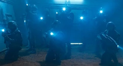 Rico orders his Troopers into formation to focus firepower against Warriors