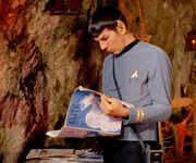  reading an issue of Elite.