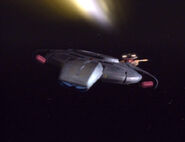 The USS Defiant being pursued by a Keldon class warship