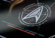 Starfleet Command insignia.
