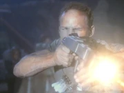 Reese fires phaser rifle