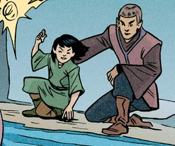 Pilok skipping stones with her father Joltair.