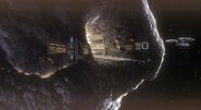 A Ralph McQuarrie painting of a spacedock carved into an asteroid (for Star Trek: Phase II).