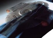 USS Defiant (NX-74205) cloaks.