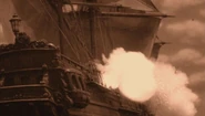 Enterprize firing broadside cannons.