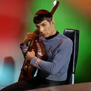 Spock plays a Vulcan lute.