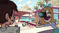 S1E7 Student photographer taking Marco's picture