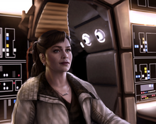 Qi'ra aboard the Millennium Falcon.
