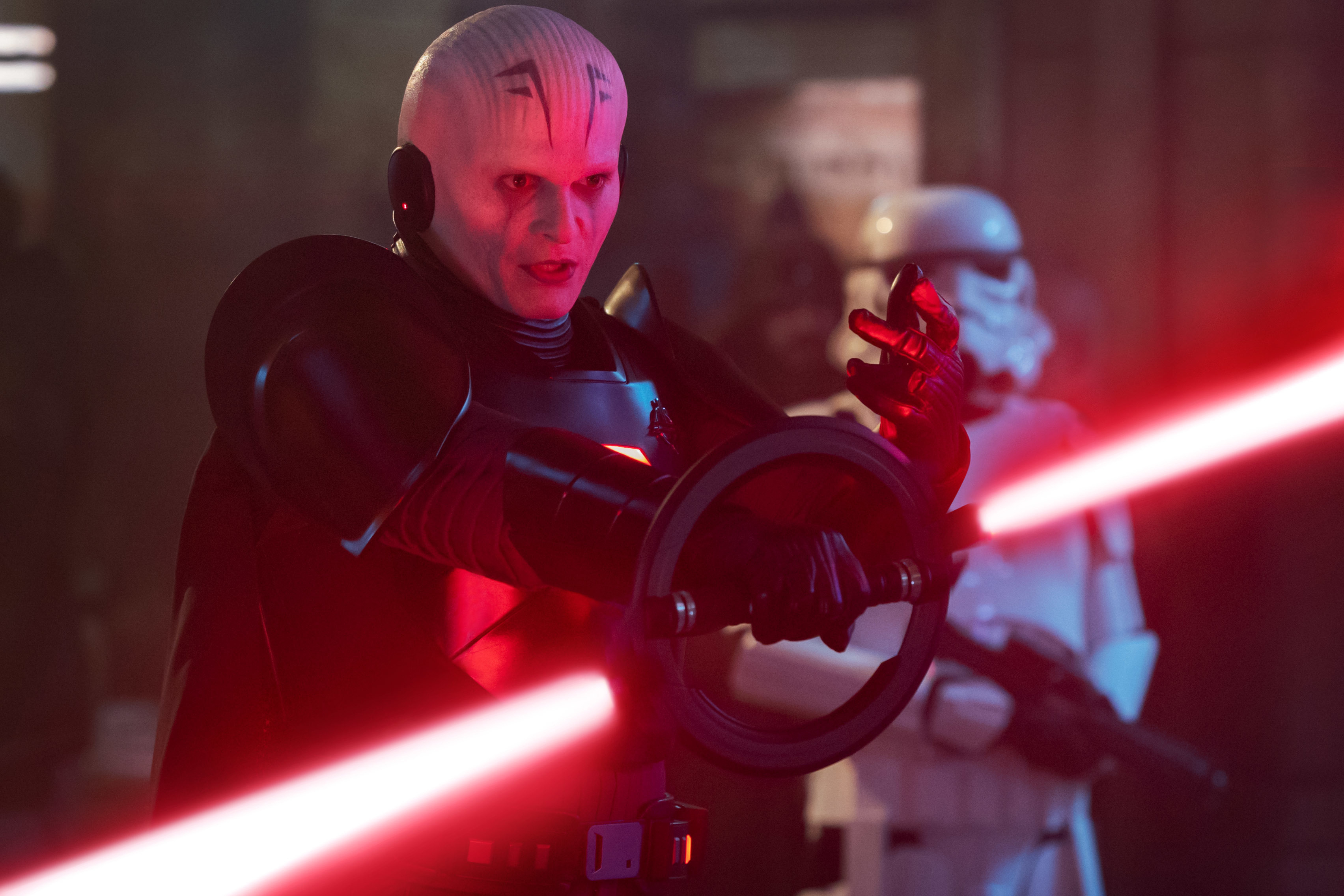 The Grand Inquisitor wielding his double-bladed spinning lightsaber