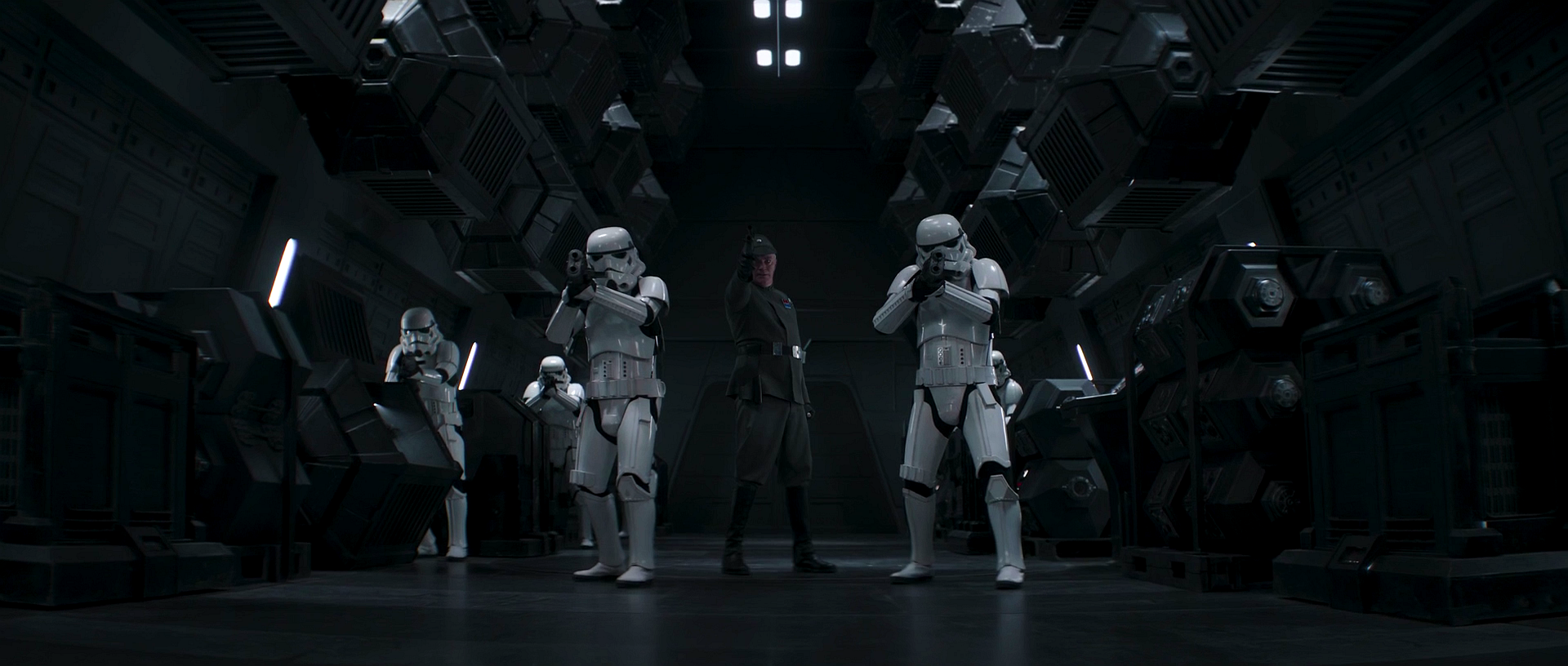 The deck officer stands with his stormtroopers to defend the cargo bay.