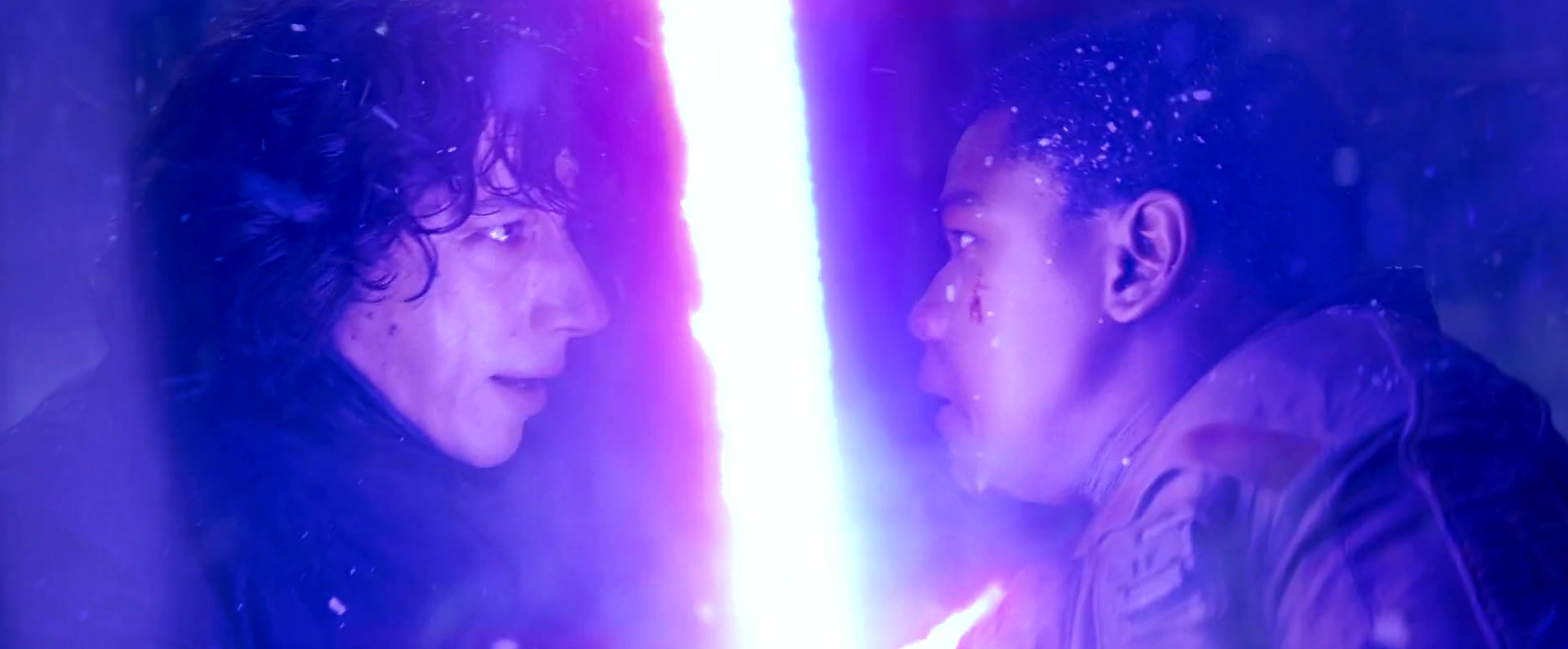 Kylo Ren locks sabers with the former stormtrooper.