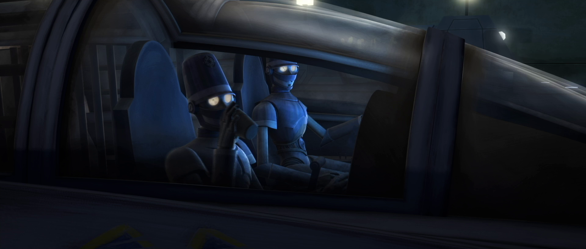 A police droid in a police speeder drinking a fluid.