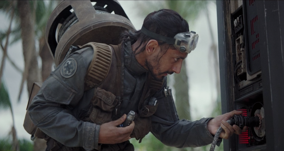 Rook plugging into a network console on Scarif