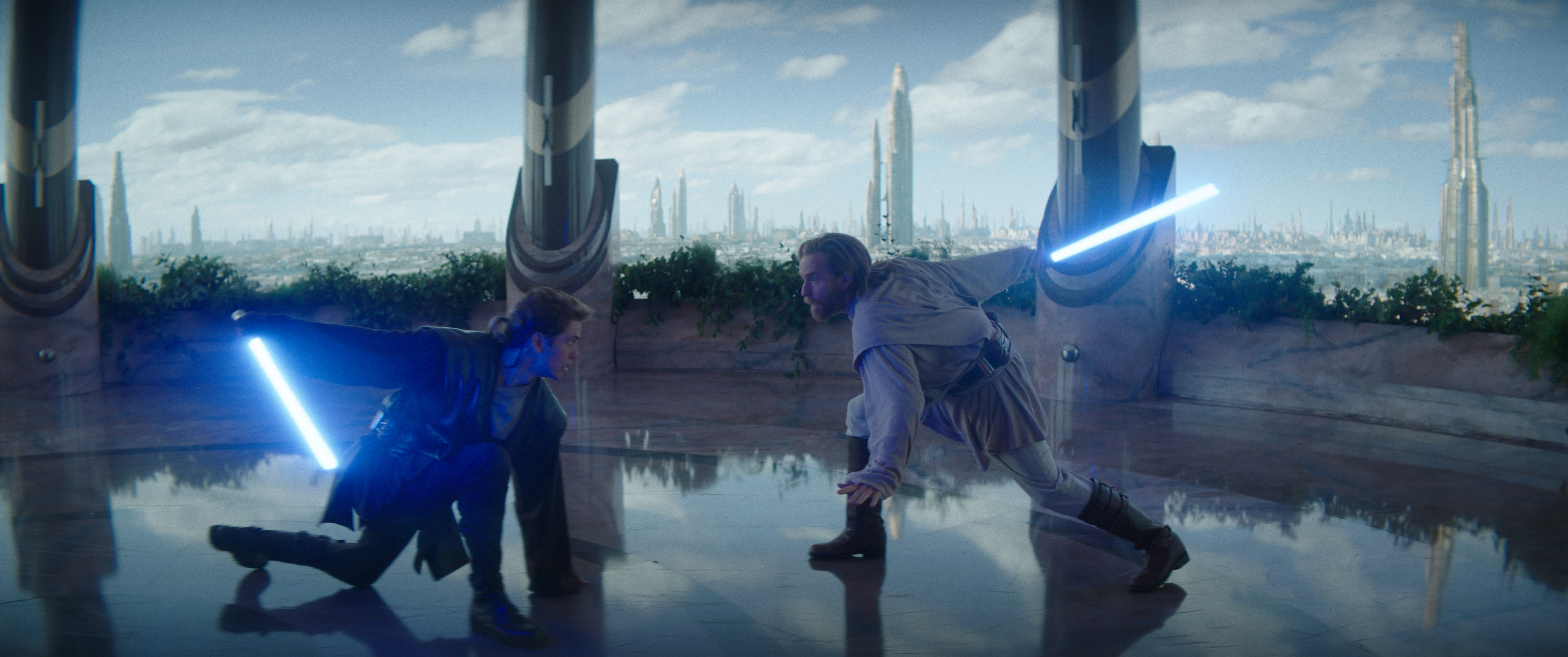 Skywalker and Kenobi spar within the Jedi Temple