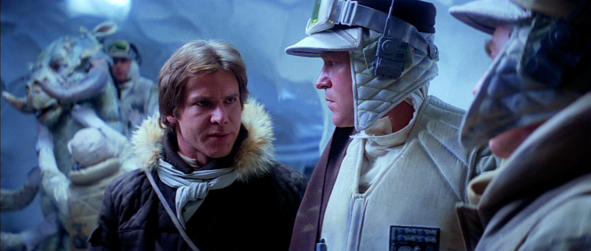 Jeroen Webb (center) looks on as Han Solo departs Echo Base to search for the missing Luke Skywalker.