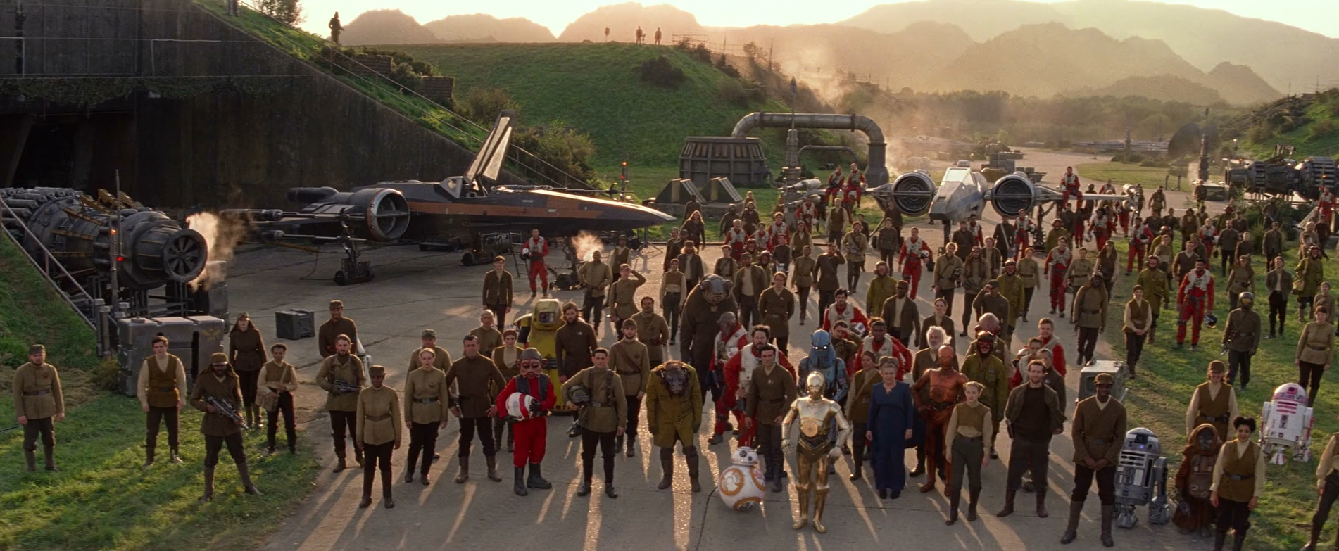 R2-KT (far right) attended the send-off of Rey and Chewbacca on their journey to find Luke Skywalker.