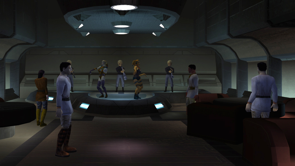 The music room of the cantina, featuring Bith musicians and Twi'lek dancers